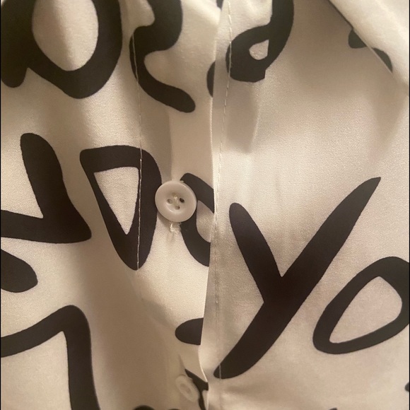 White with black letters word shirt, long sleeve, (XL). Bust 40.9, Sleeves 21.3 - Picture 2 of 4